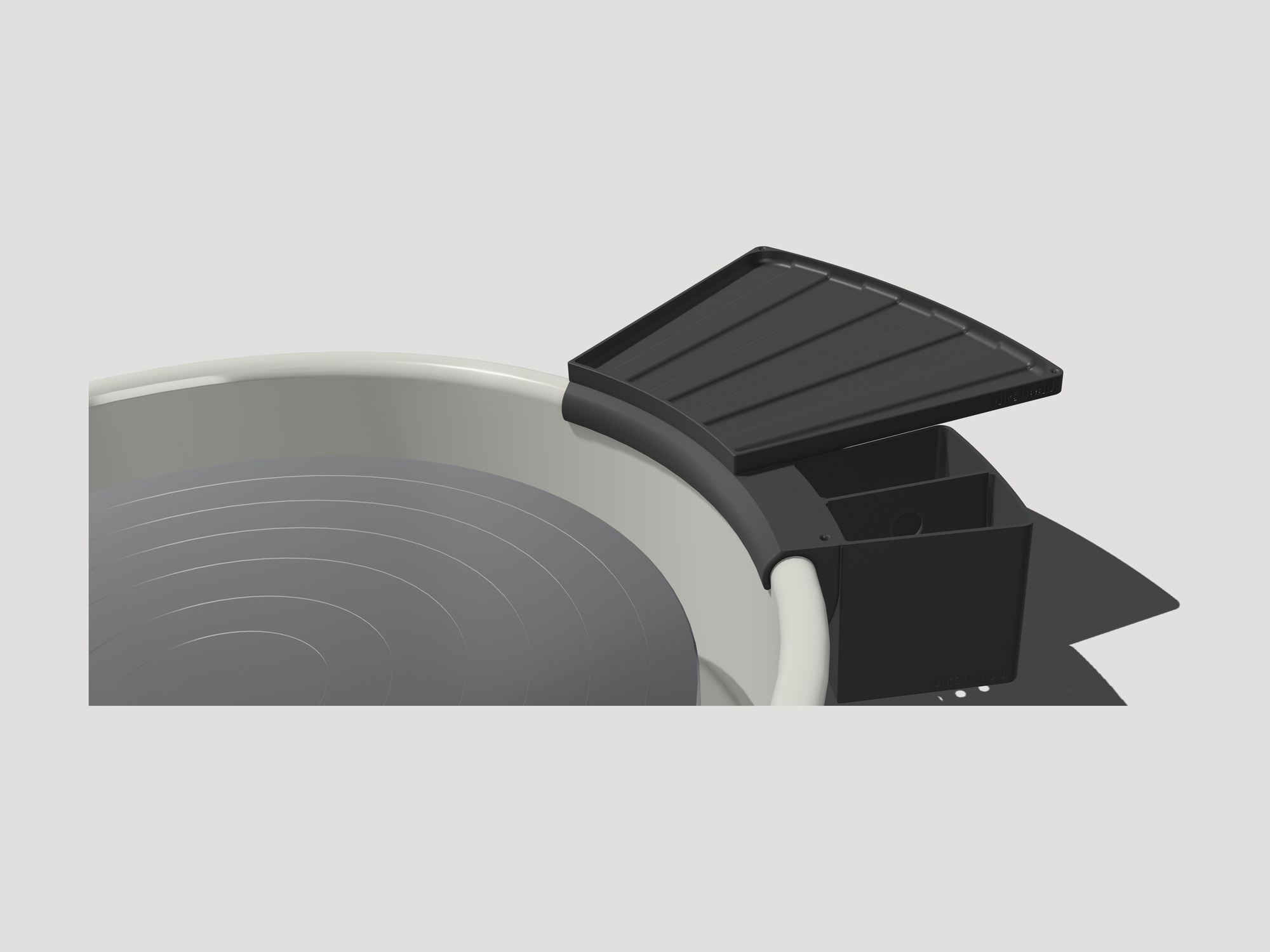 A triple deep box mounted on a pottery wheel splashpan